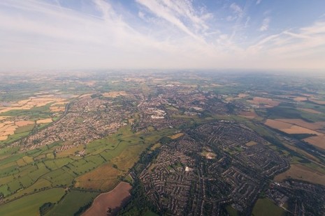 Aerial photo of a town surrounded by farmland
