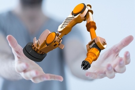 hands reaching out to touch a robot in mid air