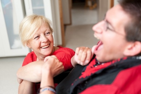 Carer talking to a man with a learning disability