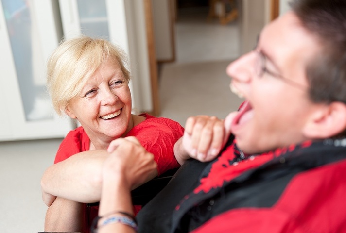 Carer talking to a man with a learning disability