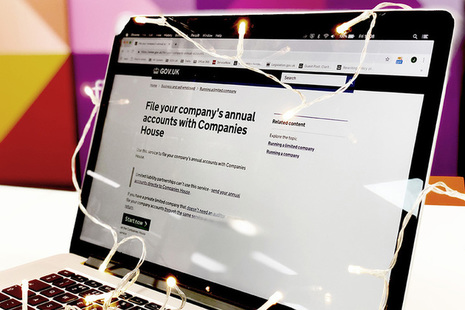 Laptop screen showing the file your company accounts GOV.UK page.