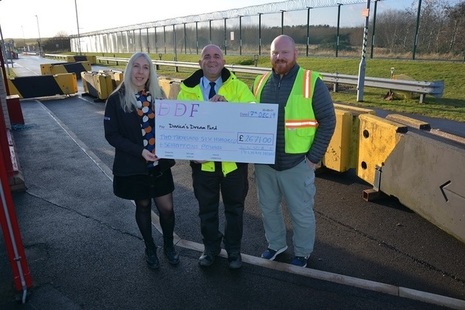 John Maxwell is presented with a cheque by LLWR duo Amanda Raynor and Neil Gregg