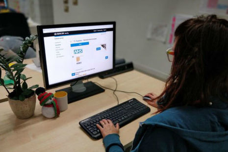 Woman using Notify NHS