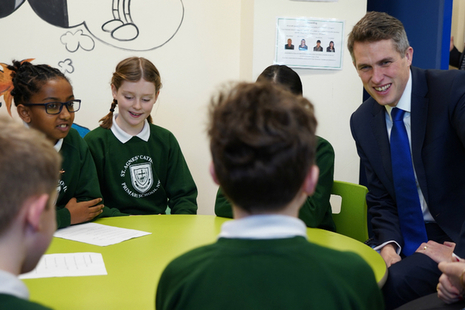 Education Secretary Gavin Williamson talks to primary school children in classroom