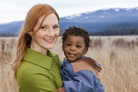 young mum with her adopted baby