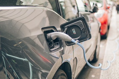 Image of car being electrically charged from a chargepoint.