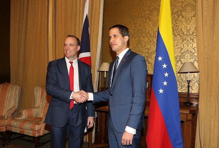 Foreign Secretary Dominic Raab shaking hands with Venezuelan interim-President Juan Guaidó