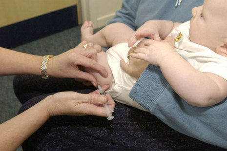 Baby being vaccinated