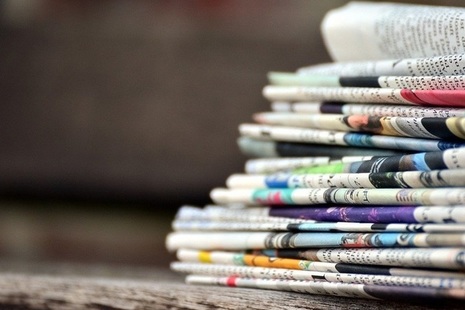 A stack of newspapers.