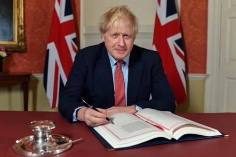 PM Boris Johnson signs the Withdrawal Agreement