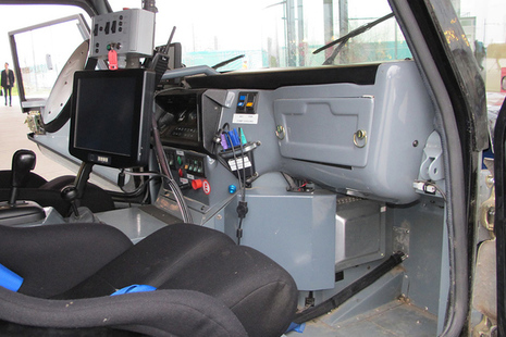 Interior view of prototype self-driving car showing dashboard systems