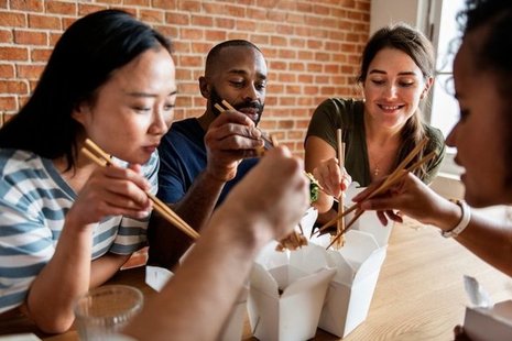 People eating takeaway food