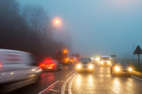 Traffic on a busy road in low light conditions