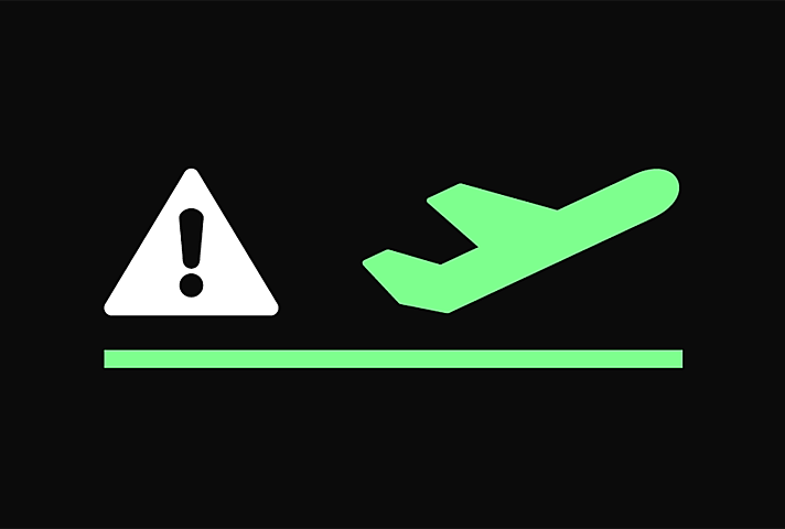 exclamation warning sign and an aeroplane
