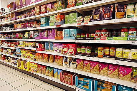 Supermarket shelves full of food