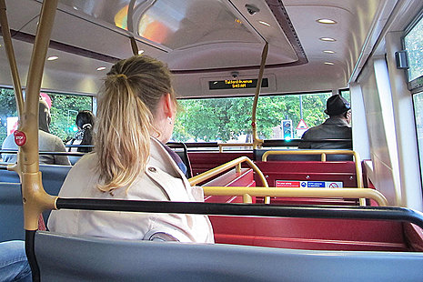 Bus passengers.