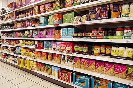 Supermarket shelves full of food