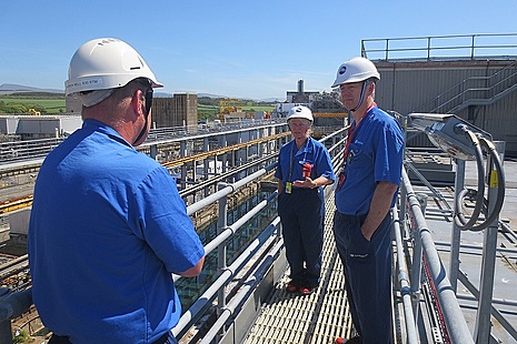 Martin Chown meeting employees on the gantry in FGMSP