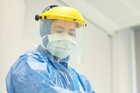 Health worker wearing a face mask