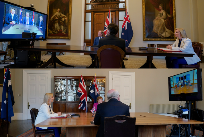 Secretary of State Liz Truss and UK representatives speaking to Australia and New Zealand representatives