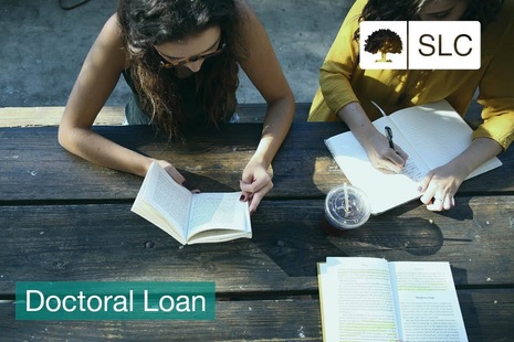 Image of two students studying on a bench with the wording Doctoral Loan across it