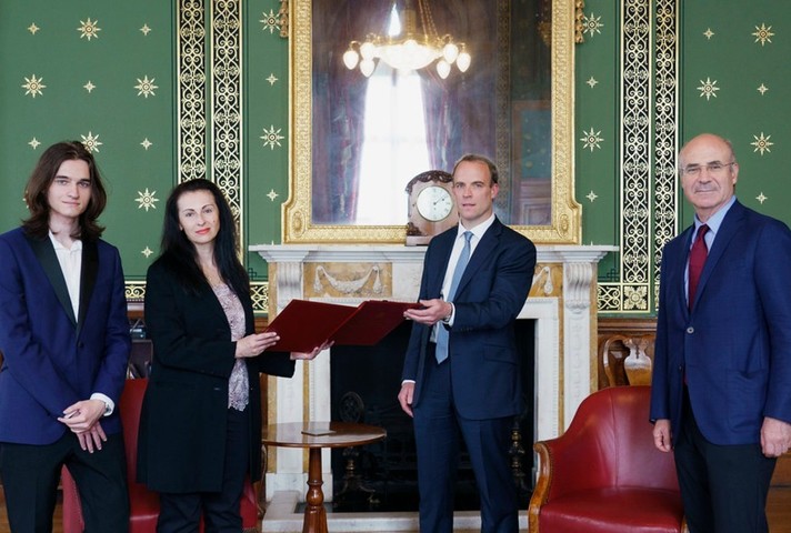 Foreign Secretary with Natalia and Nikita Magnitsky, and Bill Browder