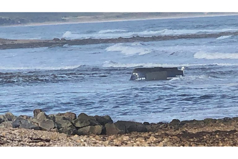Upturned hull of fishing vessel Anna-Marie II