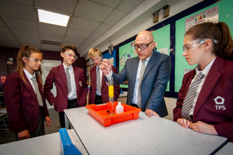 Students observing an experiment