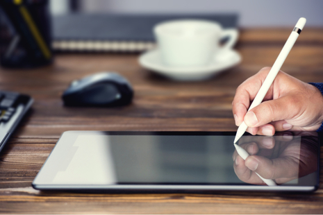 A document being signed electronically using a tablet computer.