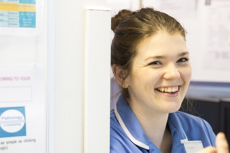 Nurse smiling in hospital