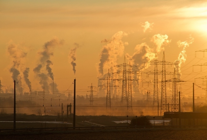 Smoke rising from industrial chimneys.