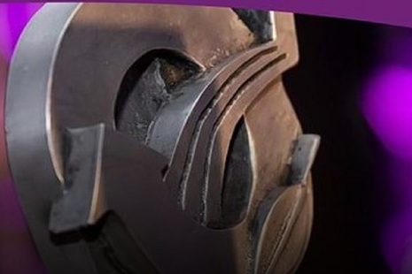 Close up image of a piece of steel work on a purple background replicating the IChemE awards
