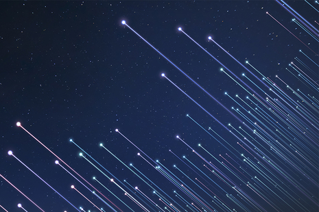 Series of coloured nodes on a blue background to represent telecoms data