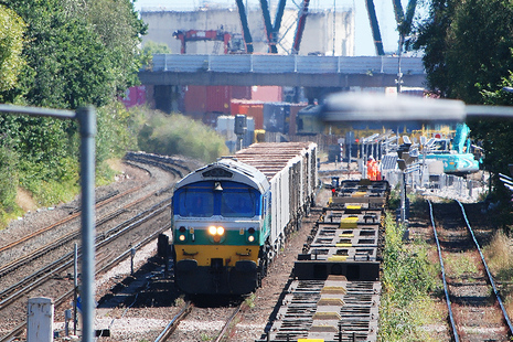 Image of a rail freight train transporting cargo.