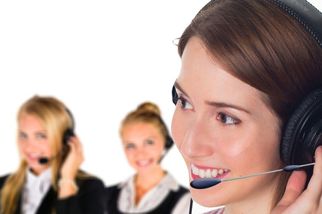 Women talking into a headset