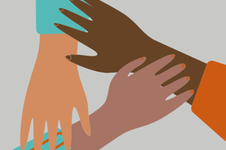 Three hands of different ethnicities touching