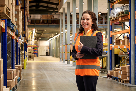 UKEF export finance manager in a warehouse