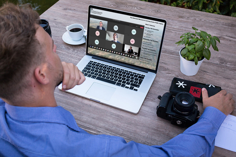 Man watching virtual event