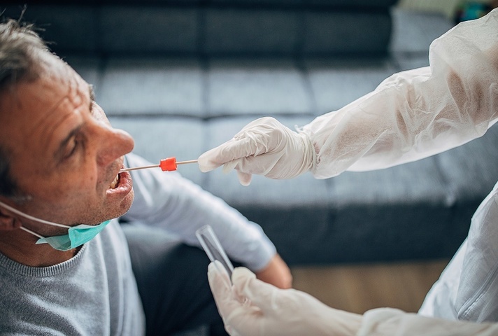 Older man having swab test for coronavirus