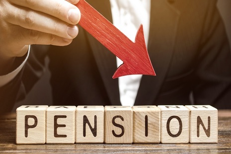 arrow pointing to pension written in wooden blocks