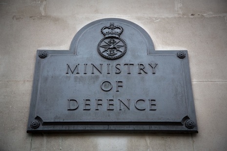 Ministry of Defence plaque on outside of building. 