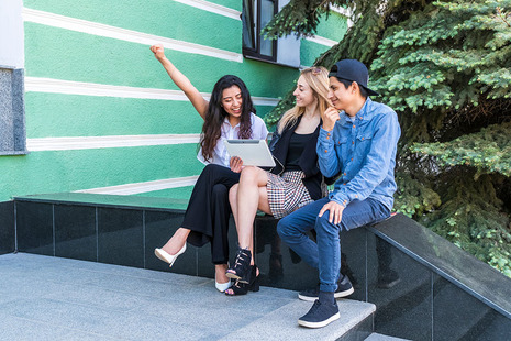 Students sitting outside