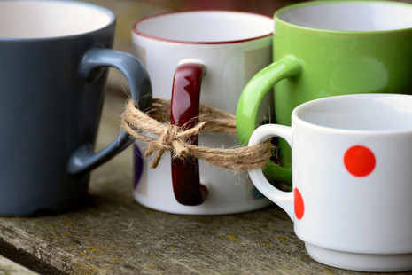 Cups tied together with string