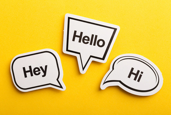 Speech bubble saying hello on a yeallow background
