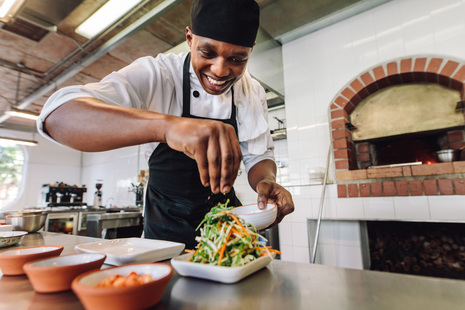 A chef prepares a meal.