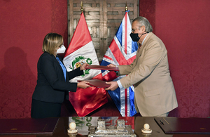 Ambassador Kate Harrisson with Peru's Foreign Minister Allan Wagner during the signing ceremony.