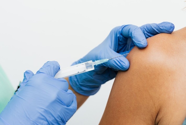 Person receiving vaccination