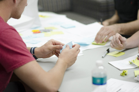 People in a workshop discussing ideas