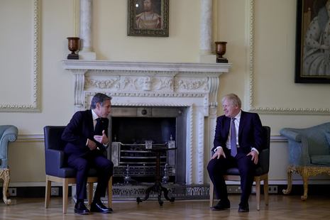 Prime Minister Boris Johnson sitting with US Secretary of State Antony Blinken