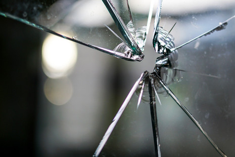 Bullet hole in glass